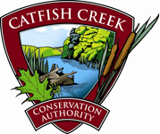 Catfish Creek Conservation Authority logo with image of a creek and forest in the centre .